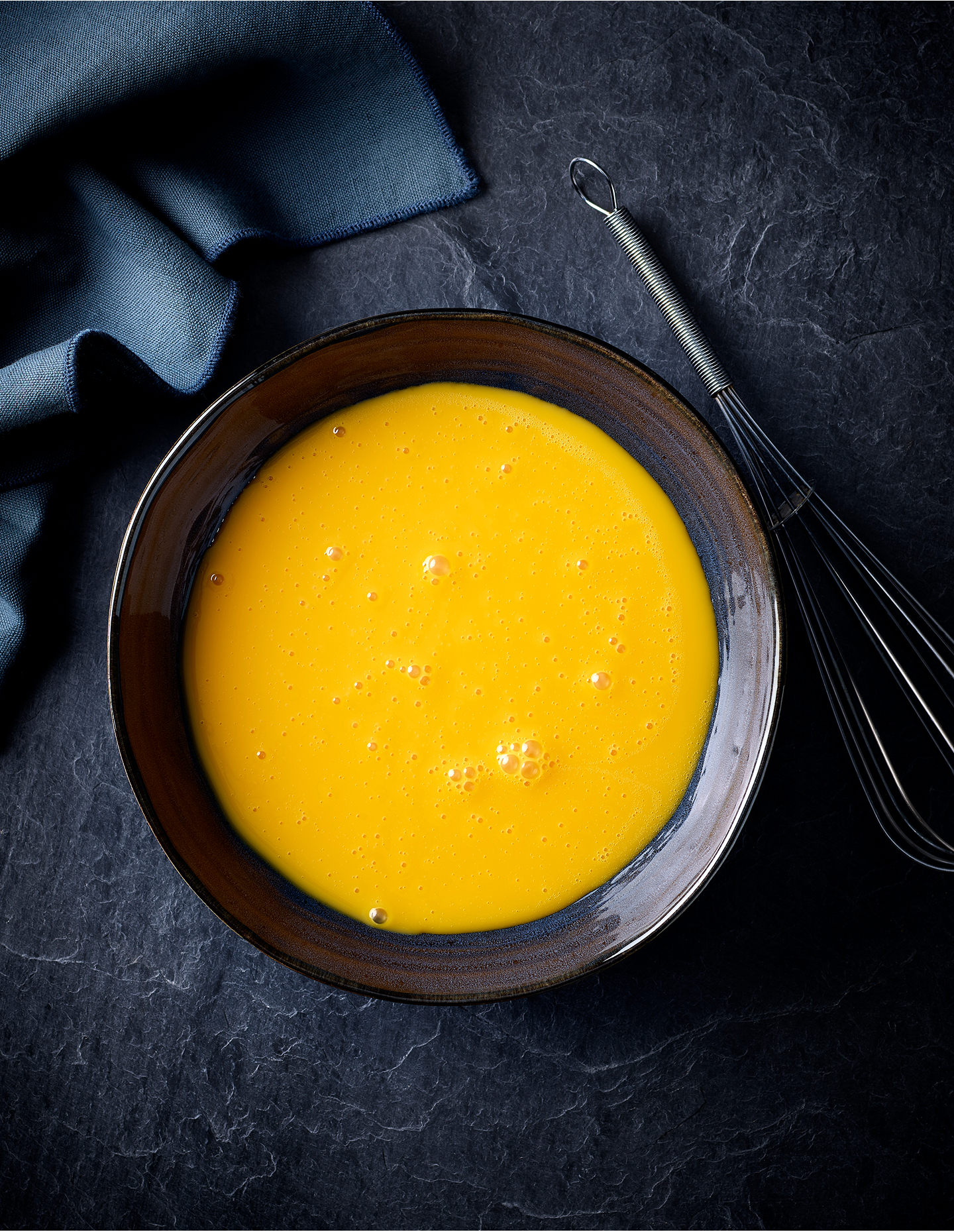 Liquid and egg spray