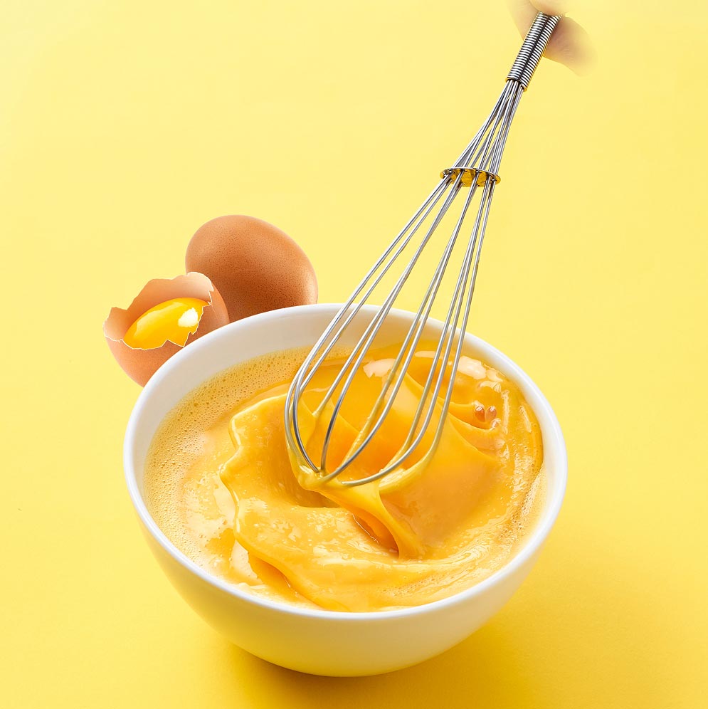 bowl with beaten eggs